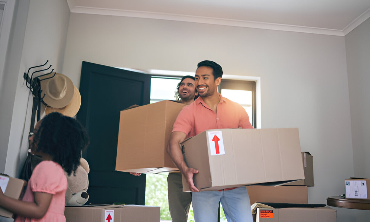 Happy, new home and box moving with child and gay parents